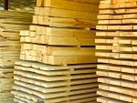 7350300 assorted stacked lumber on stock of commercial timber